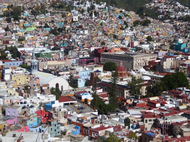 We're back up on the ridge and looking down to a point about 500 meters west of the basilica. That's the cylinder-vaulted Mercado Hidalgo on