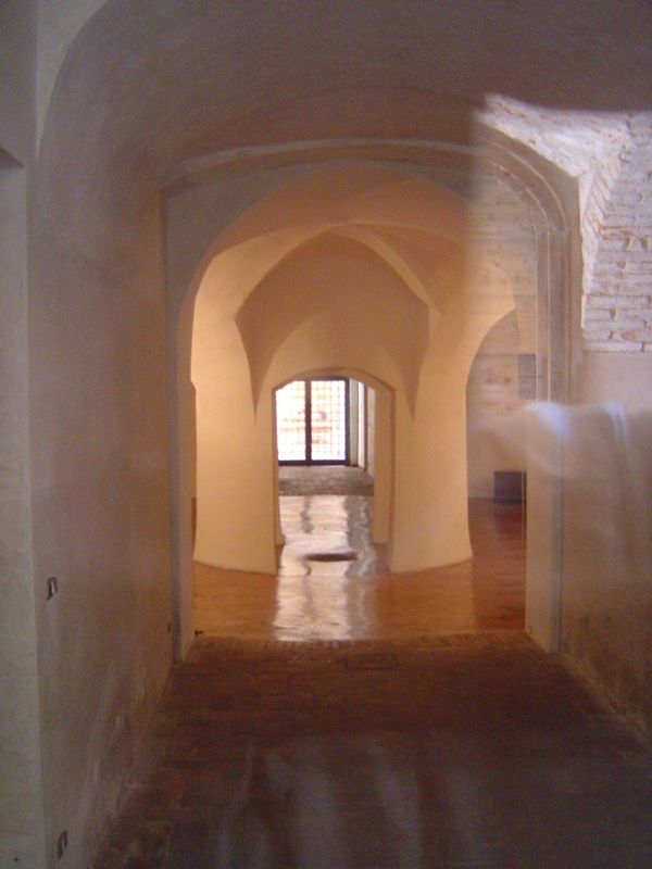 Under the northeast portico there a window looking through the building, which, from this angle, looks almost small. The dome, like the one 
