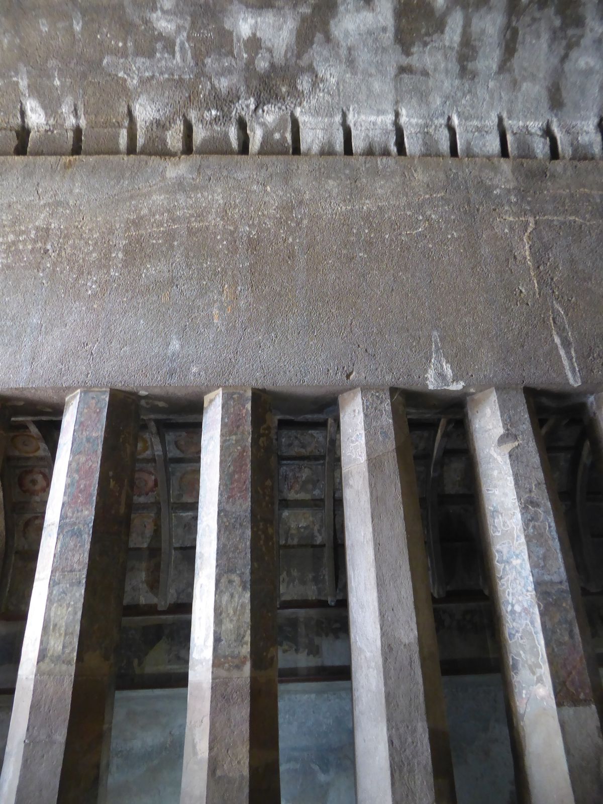 A good picture of the blank entablature, the octagonal columns, and the framework that once held the wood fittings that made the hall feel r