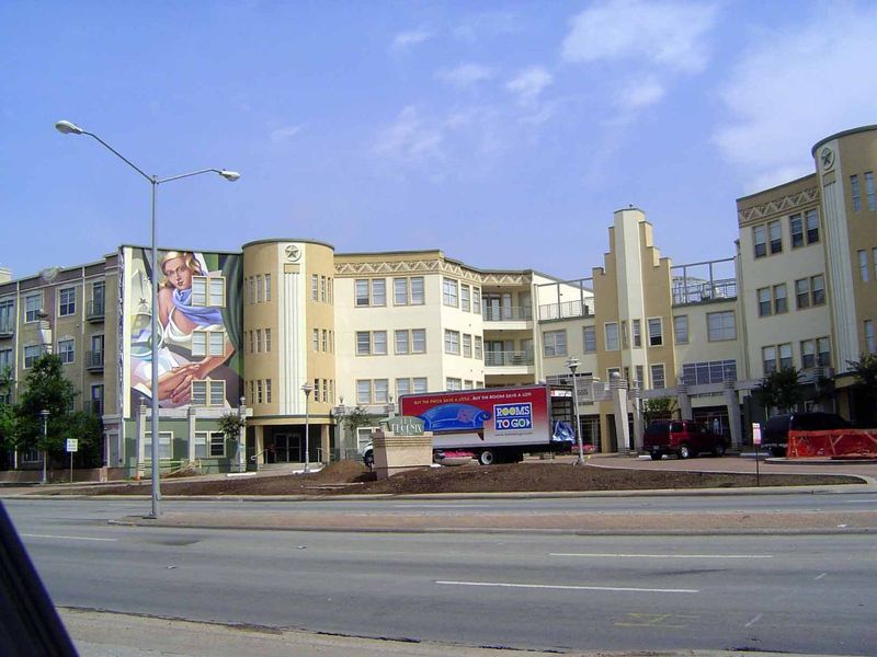 A block to the east, an old Dr Pepper bottling plant has been razed and replaced with this retro apartment block, with shops on the ground l