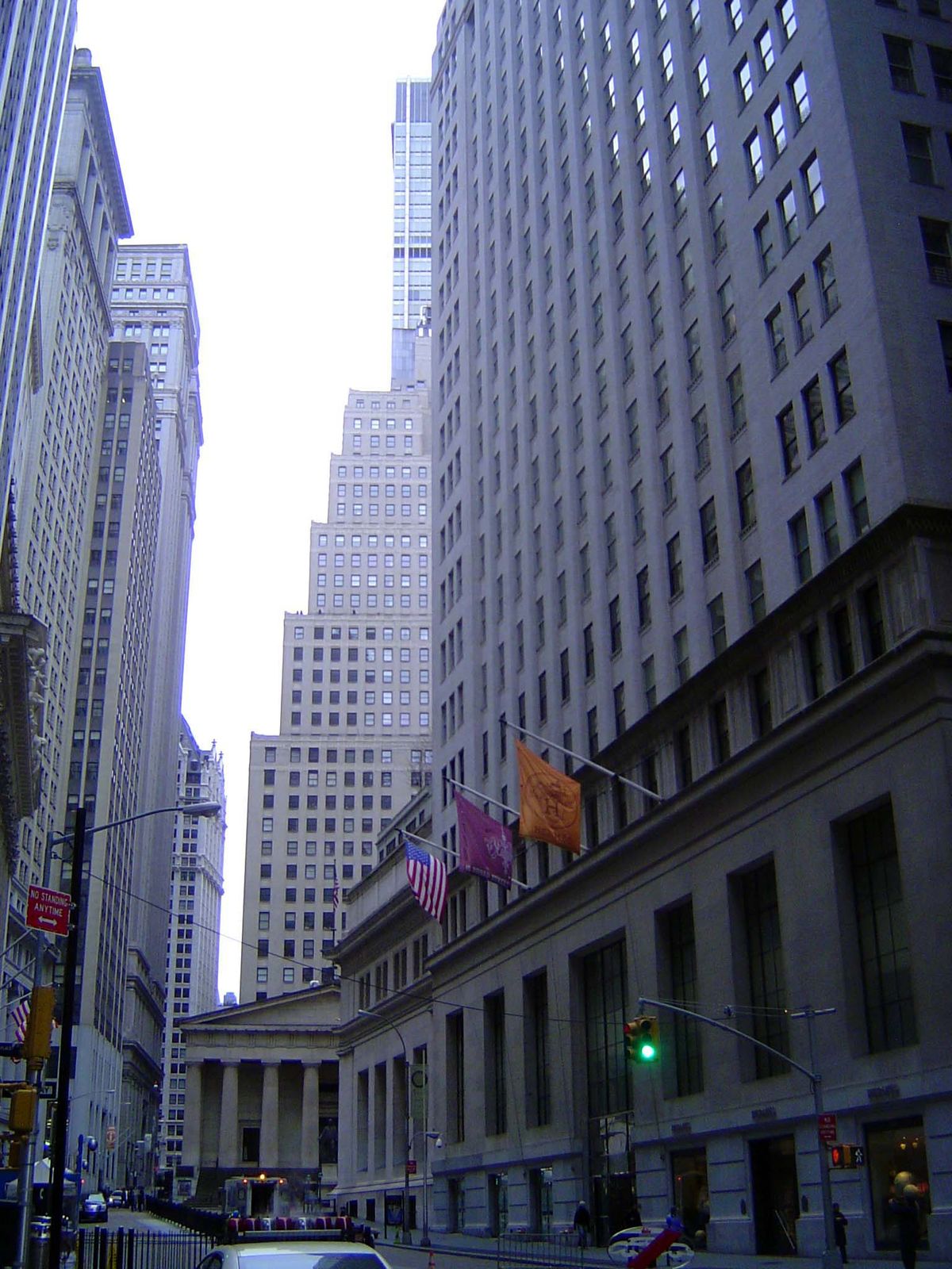The view down Broad, with the old Chase Manhattan building behind Federal Hall and the stock exchange barely visible to its left. On the rig