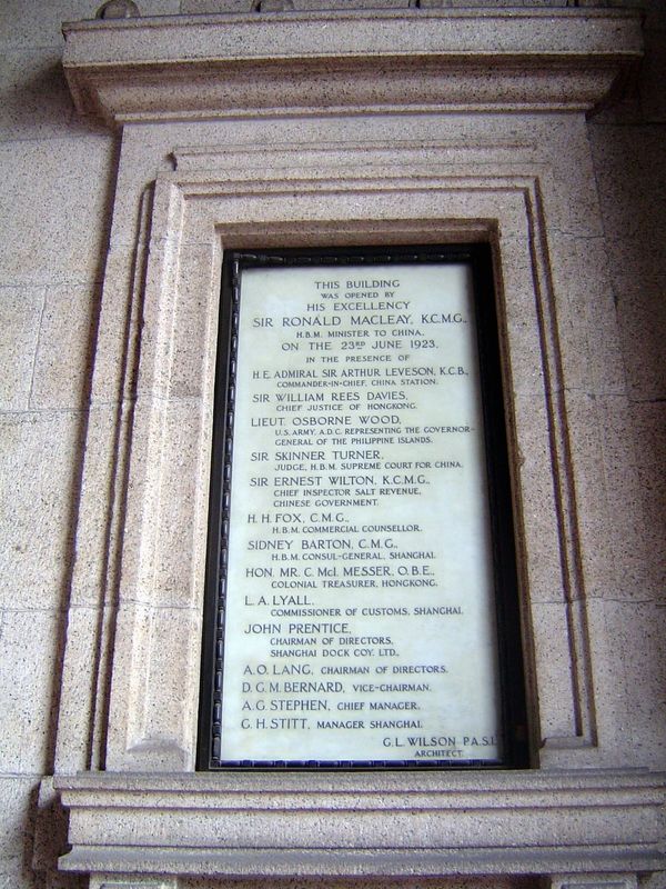 Portico plaque. The architect, George Wilson, asked for an extra $1 million "to enhance the building." He was told to "spare no expense but 