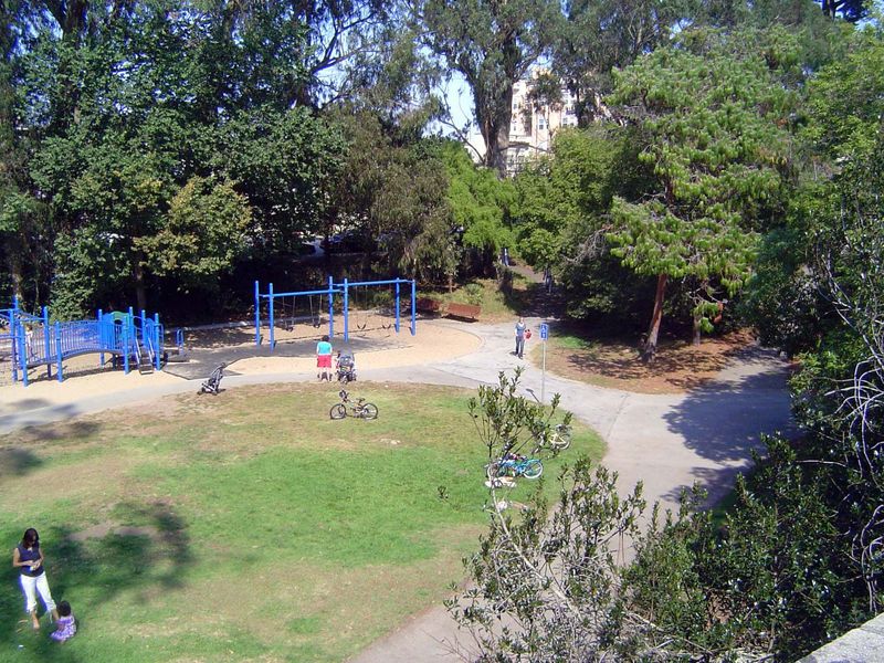 The boy often entered the park past what is now this playground but was then a small duck pond. The boy's mother years later told him she re