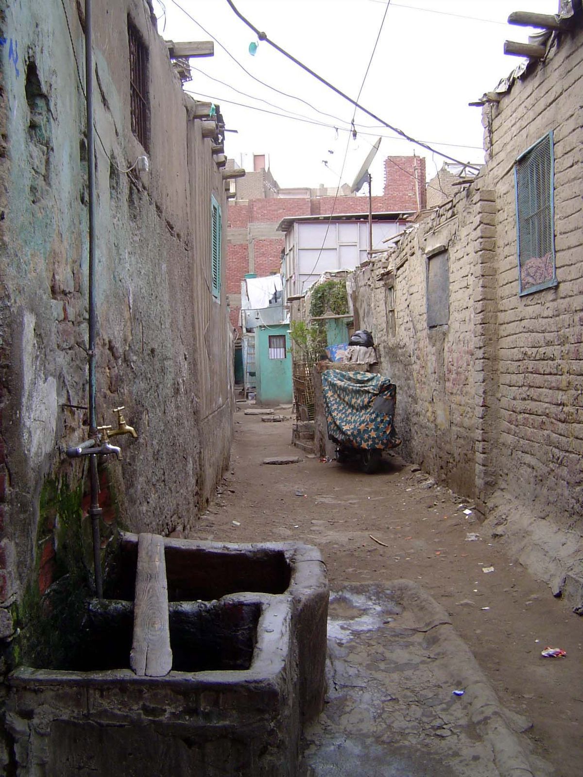 If you really want to know what's behind the facade, this is the answer—another Cairene village.