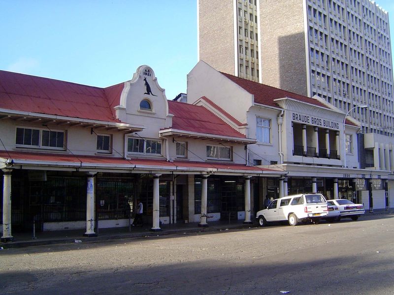 The territorial-style ironwork of the commercial district eventually fell from fashion. The gable kangaroo is a puzzle.