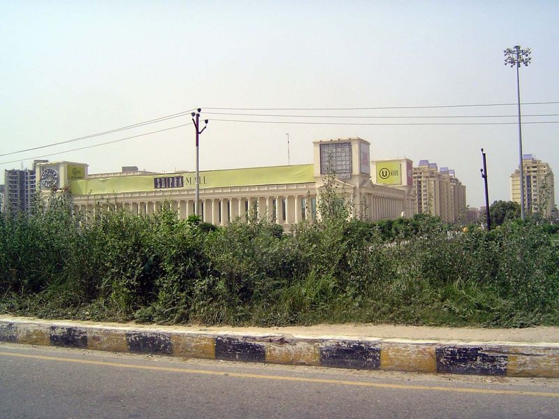 Another view. The building echoes some of the official buildings of British New Delhi, right down to the choice of color.