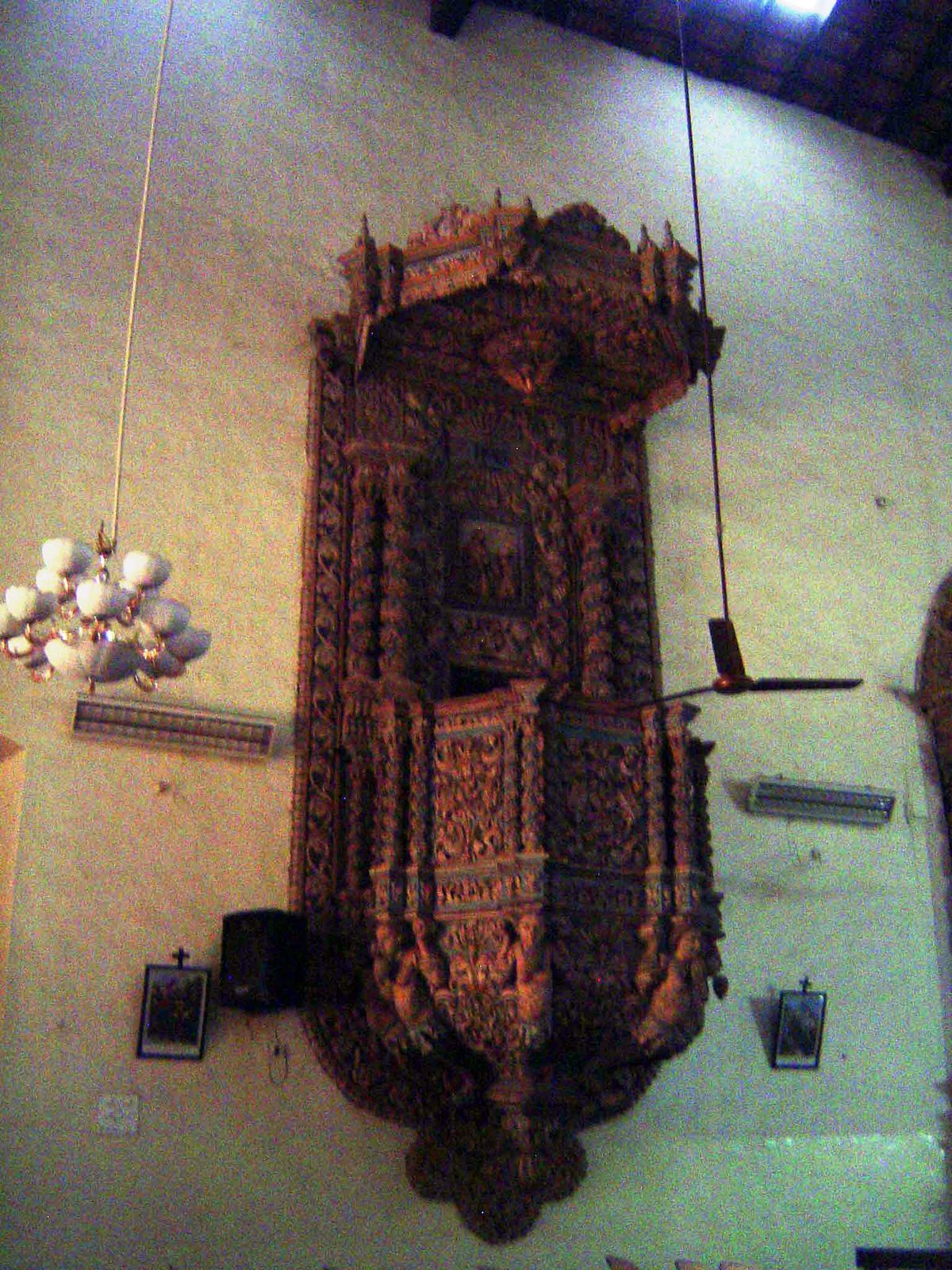Except that it has one of those amazing pulpits, prodigies of woodcarving.