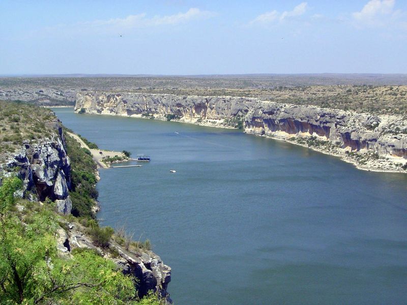 Thirty-five airline miles upstream, the Pecos joins the Rio Grande. The view here shows that point, with the Pecos flowing away from the cam