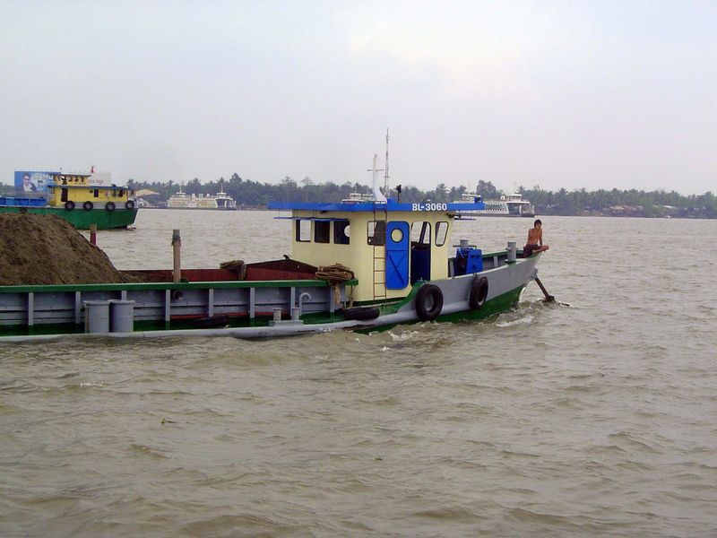 You can't hear the ferry's horn blasting, so imagine the pilot cursing this hotshot.