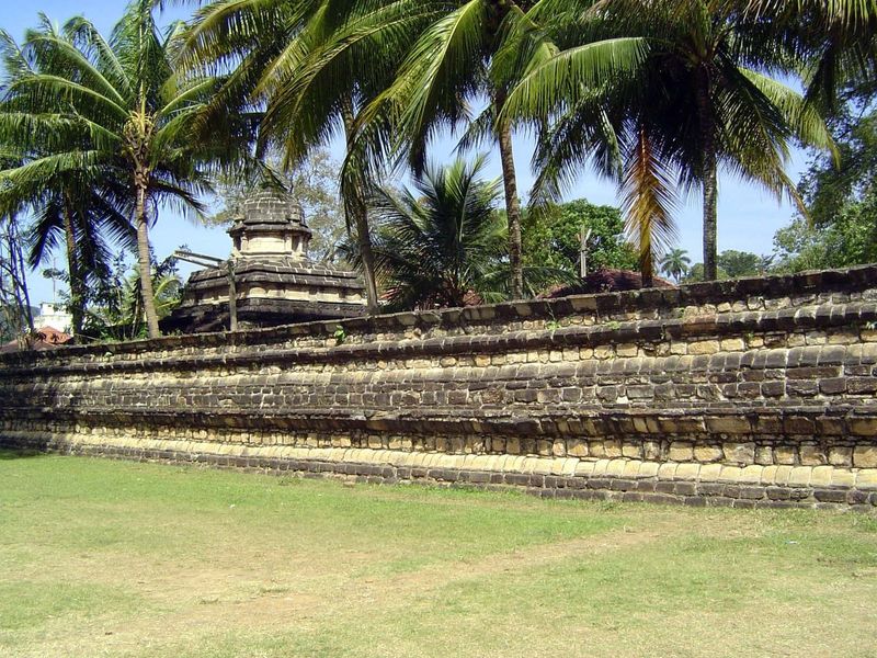 Another stone wall rims an enclosure around devales or temples for three protective deities: Natha taken as equivalent to Avalokiteshvara, V