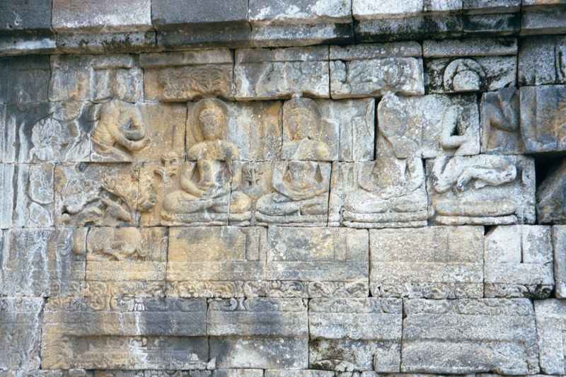 To honor his decision, gods assume the form of Brahmans and descend to earth to teach. The figure on the right is still coming down.