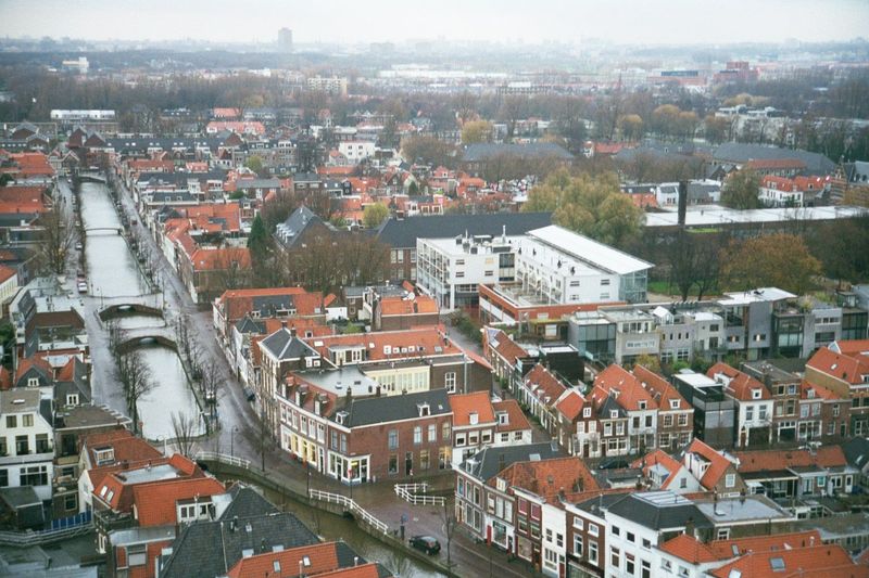 Looking to the north, with a group of flagrantly modern buildings. They cluster behind the hard-to-see park called the Doelinplein, just to 