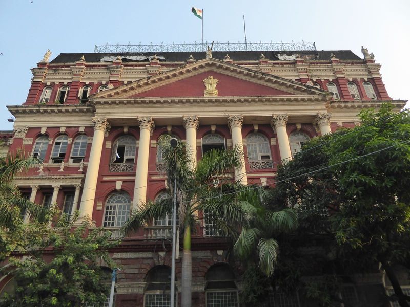 Here's one end of the facade added about 1882.  The British coat-of-arms is gone, replaced by the lion capital adopted by India in 1950. And