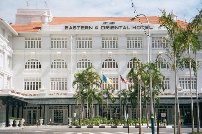 This is the E\&O, opened in 1885 by the Sarkies Brothers, who also owned the Raffles Hotel in Singapore and the Strand Hotel in Rangoon. The