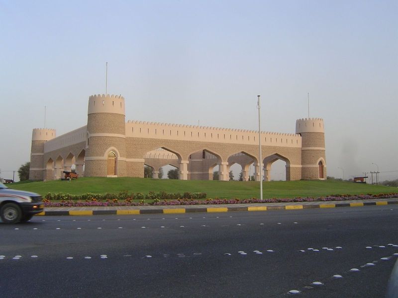 Here, closer to Muscat, is an allusion to the old forts still common in Oman.