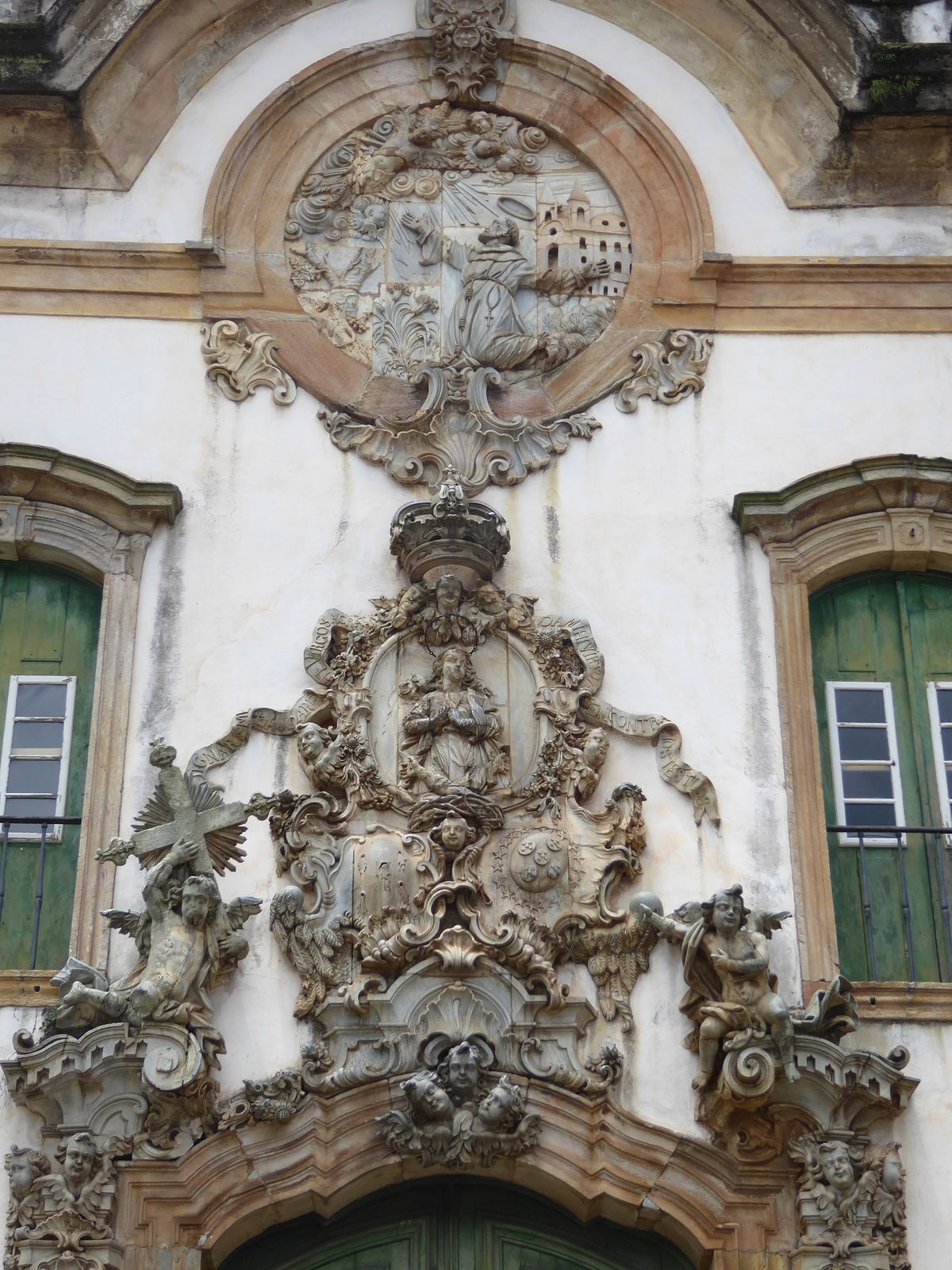 The sculptures are in soapstone; the one at the top shows Francis in ecstasy and/or receiving the stigmata. It's by Aleijadinho, the "little