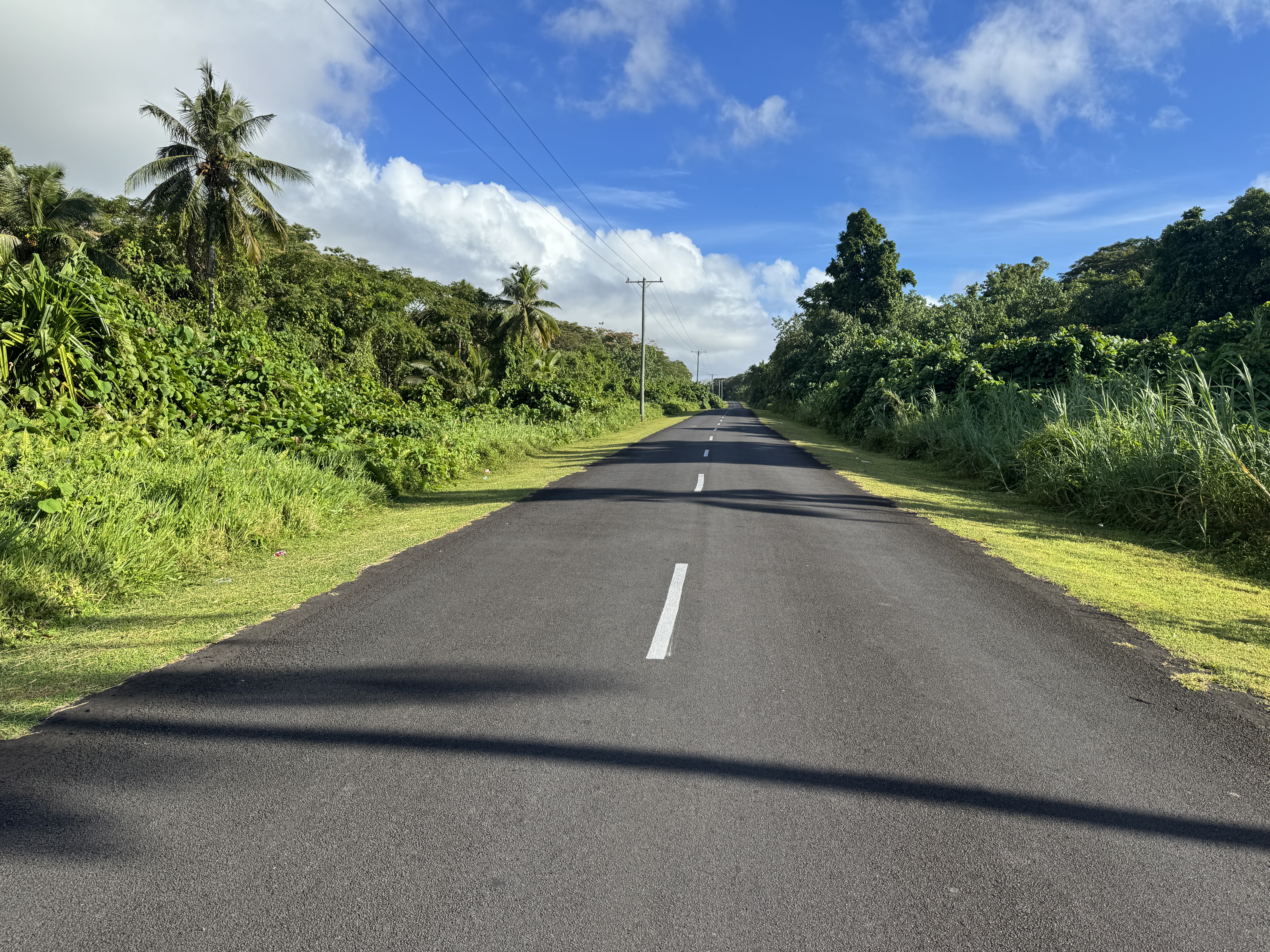 There's a  circumferential road, and it's in surprisingly good shape for a lower-middle-income country.  Think or thank foreign aid, which i
