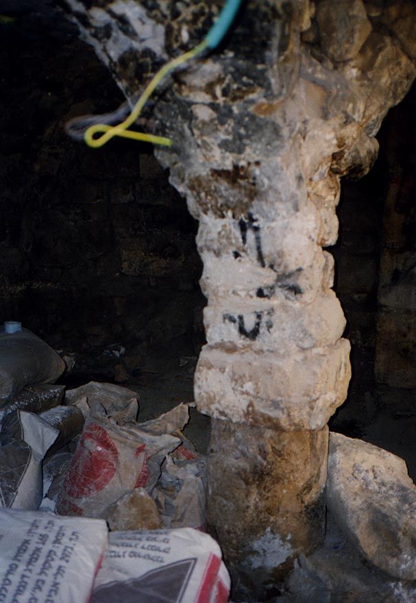 At the bottom of one such pier, the anomaly of a column.