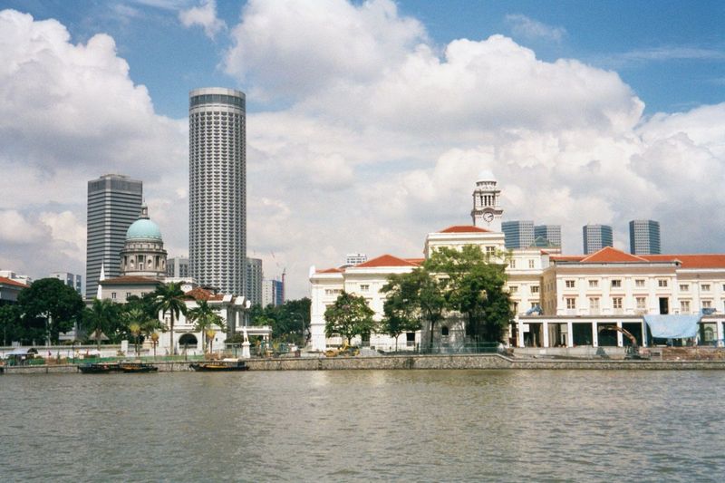 The domed Supreme Court and the modest Parliament House; behind it, the tower rises of the very active Victoria Concert Hall. In the backgro