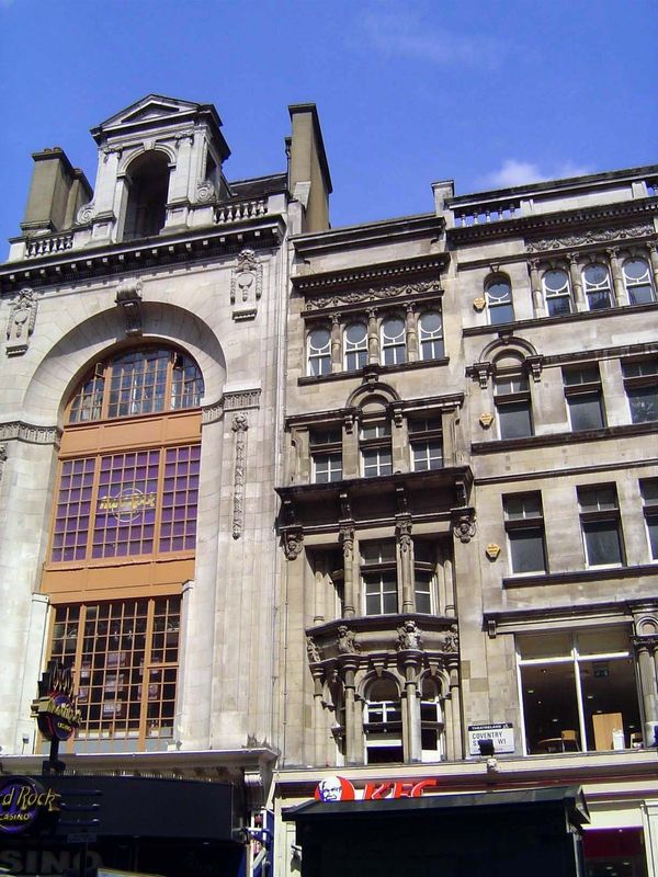 What were later office buildings like? If the builder was short on land, the result could be like this pinched facade from 1913, on Coventry