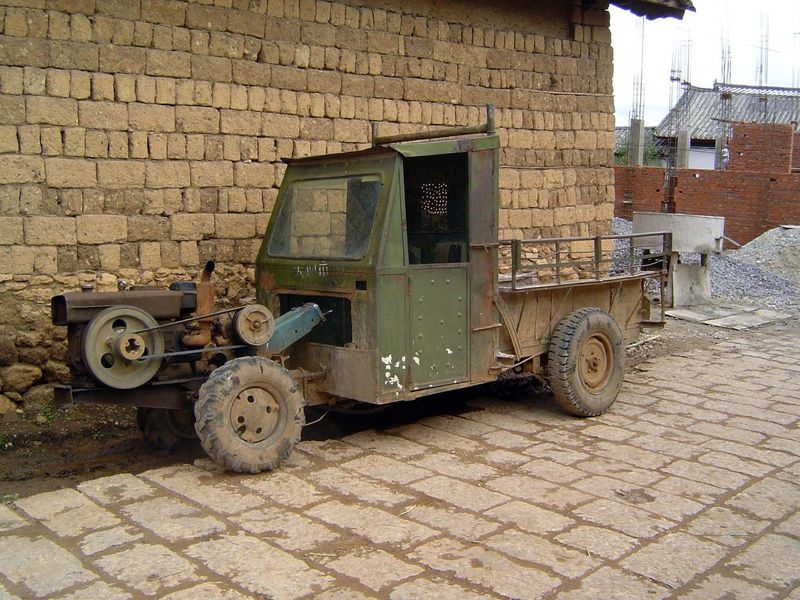 The classic Chinese hand-tractor, commonly enclosed now.