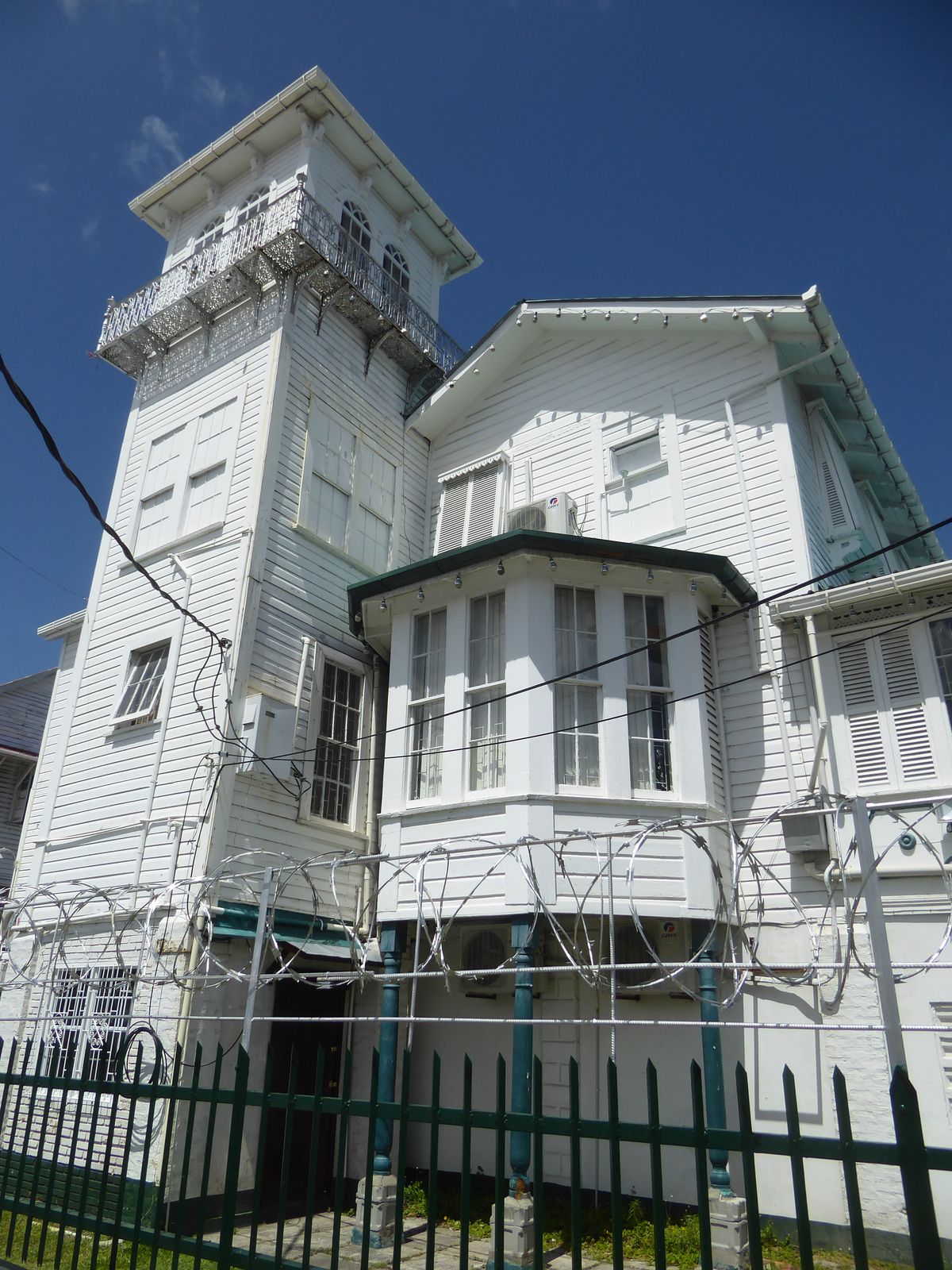 This house is known, none too distinctively, as the Tower House. You might guess it's Victorian, but no: it was built about 1924 as two stor
