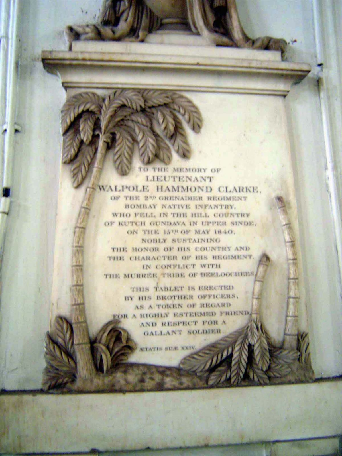 Monument with truncated palm.