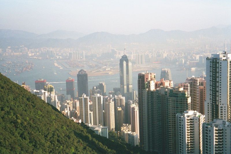 The first of three pictures panning right from the demure rooftop of the tram station. Kowloon in the distance; Central District at the foot