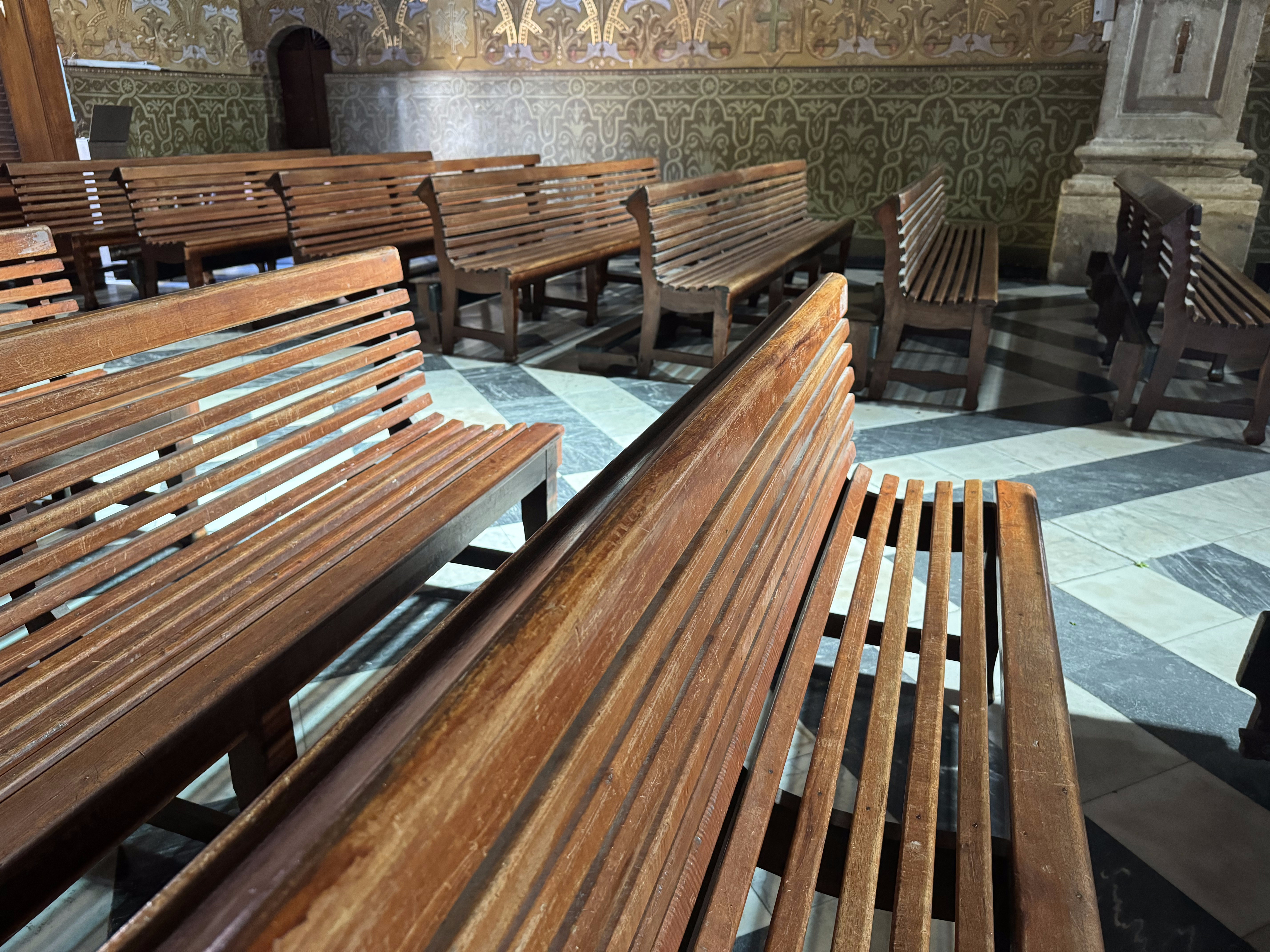 The slatted pews are brilliant.  I'm not being sarcastic.   Maybe you have to be sweating in the heat to appreciate them.