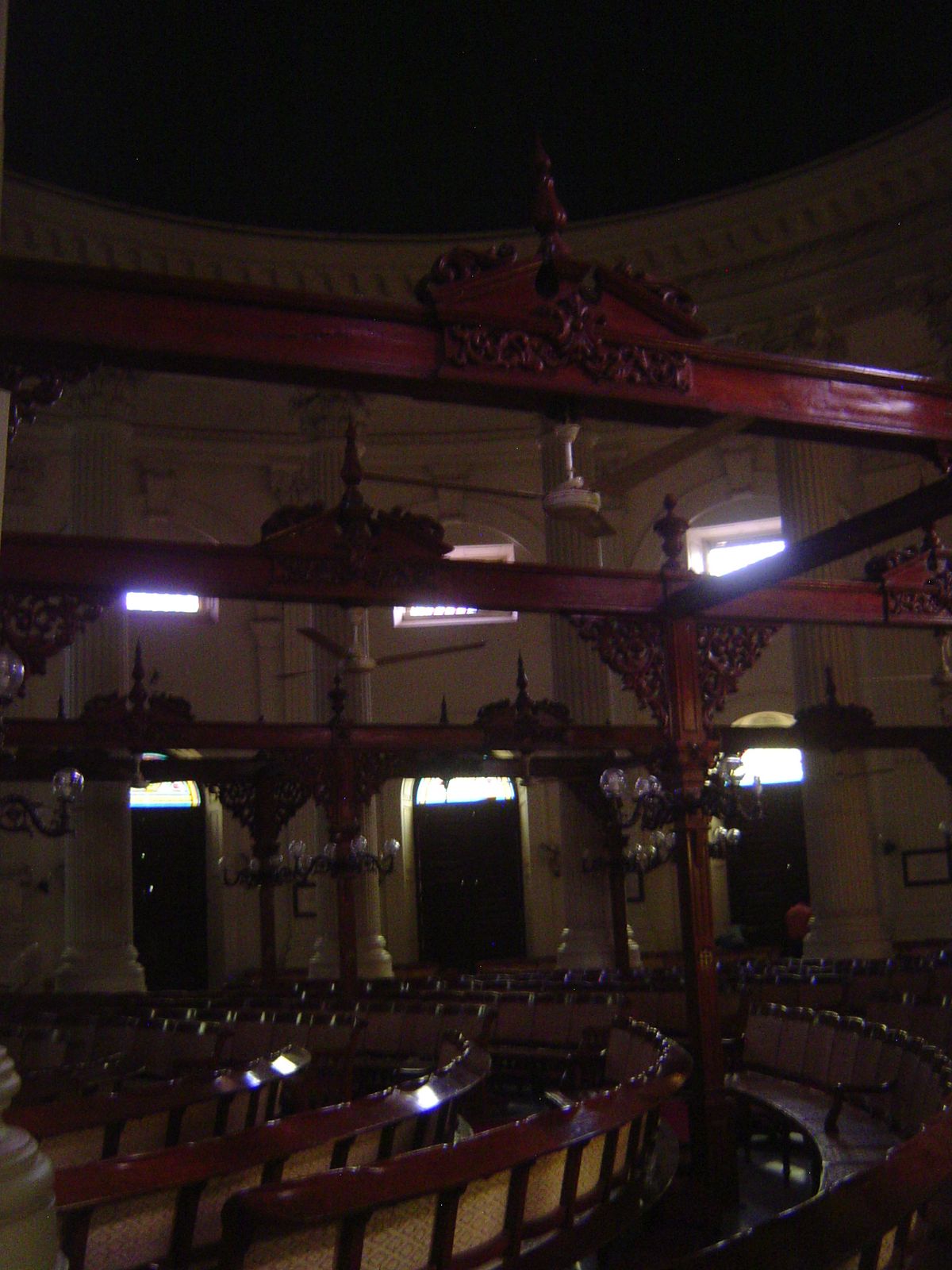 The heavy framework isn't there for the fans; it was built to support the old manually operated cloth fans called punkas.