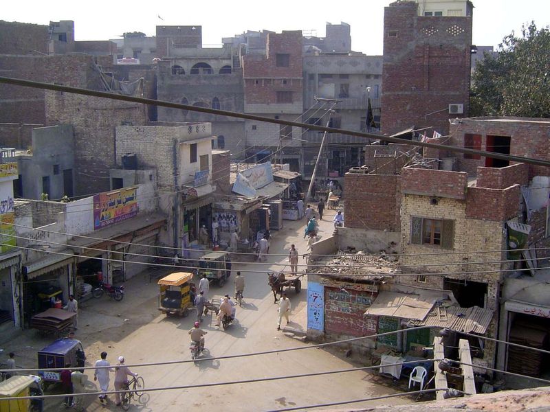 We're standing atop the wall of the Lahore Fort and looking into the Old City, which, quite obviously, is not old, at least in the sense of 
