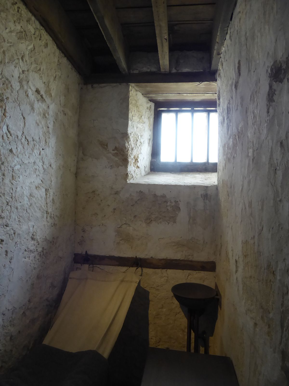 Most of the day was spent right here—including meals. Later on, cells were enlarged to hold two men.
