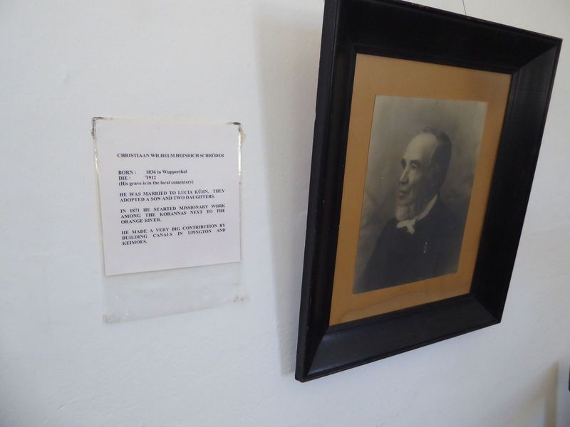 Shroder's portrait hangs in the nearby museum. The sign notes his major role in the development of irrigation canals.