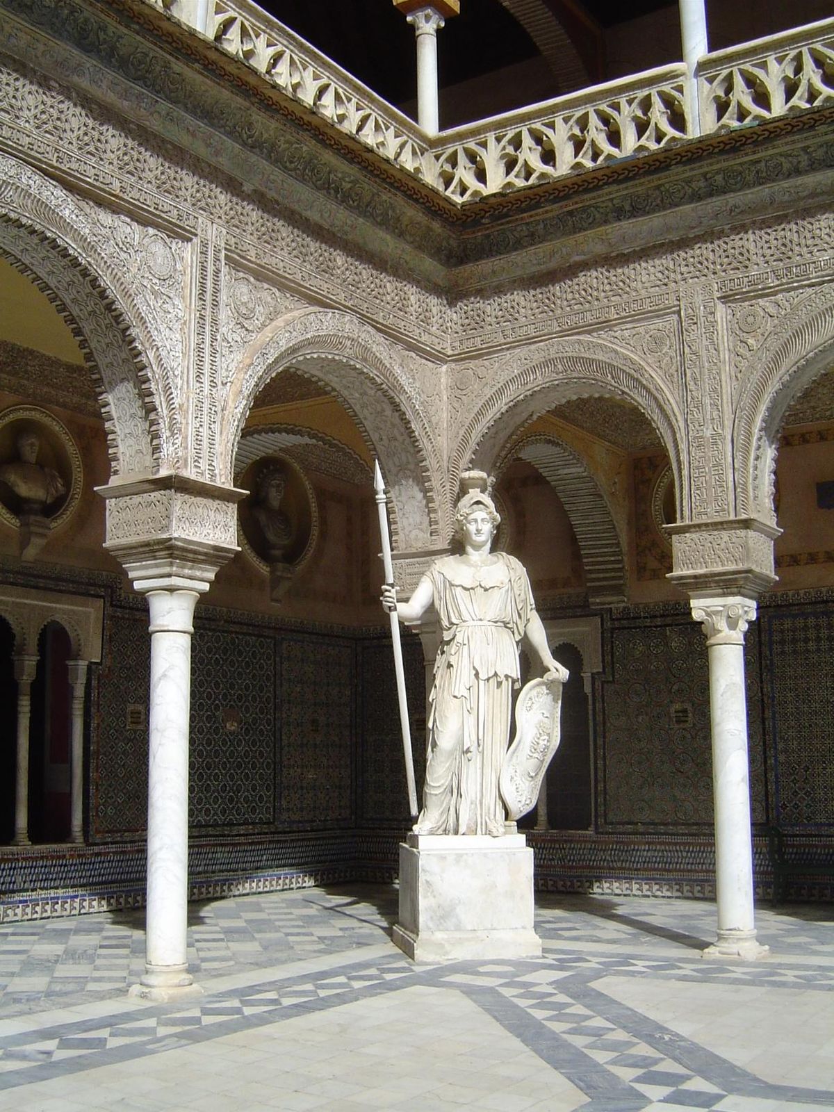 A touch of eclecticism: Athena and the genuine article, too, straight from the 5th century B.C. stands in front of an arcade that comes equa