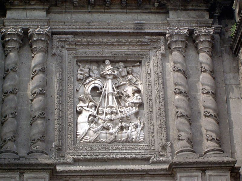 Above the right-hand portal, St. Peter and the apostles appear on a relief titled "The Ship of the Church Sails the Seas of Eternity."