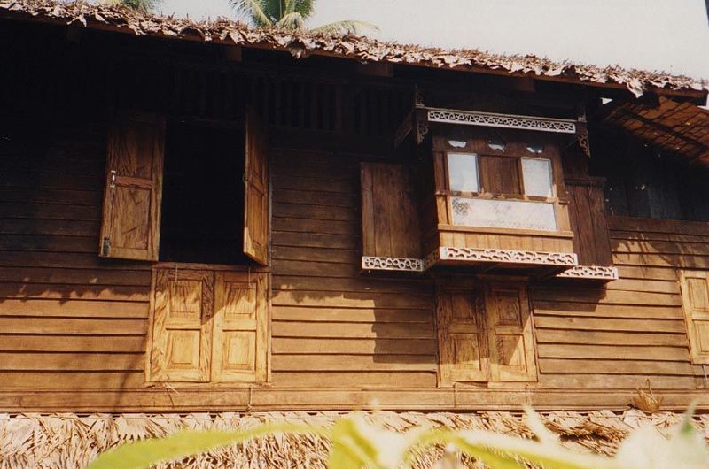 One such house, newer than most and a bit fancier. This is historic teak country, of course.