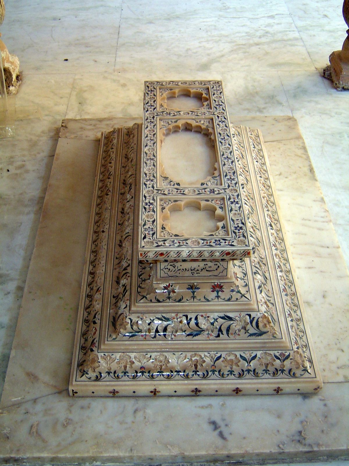 The tomb of Hussain un-Nissa Begum, a daughter of the fifth nizam. It's unique among the Paigah tombs for its insets of hard, semi-precious 