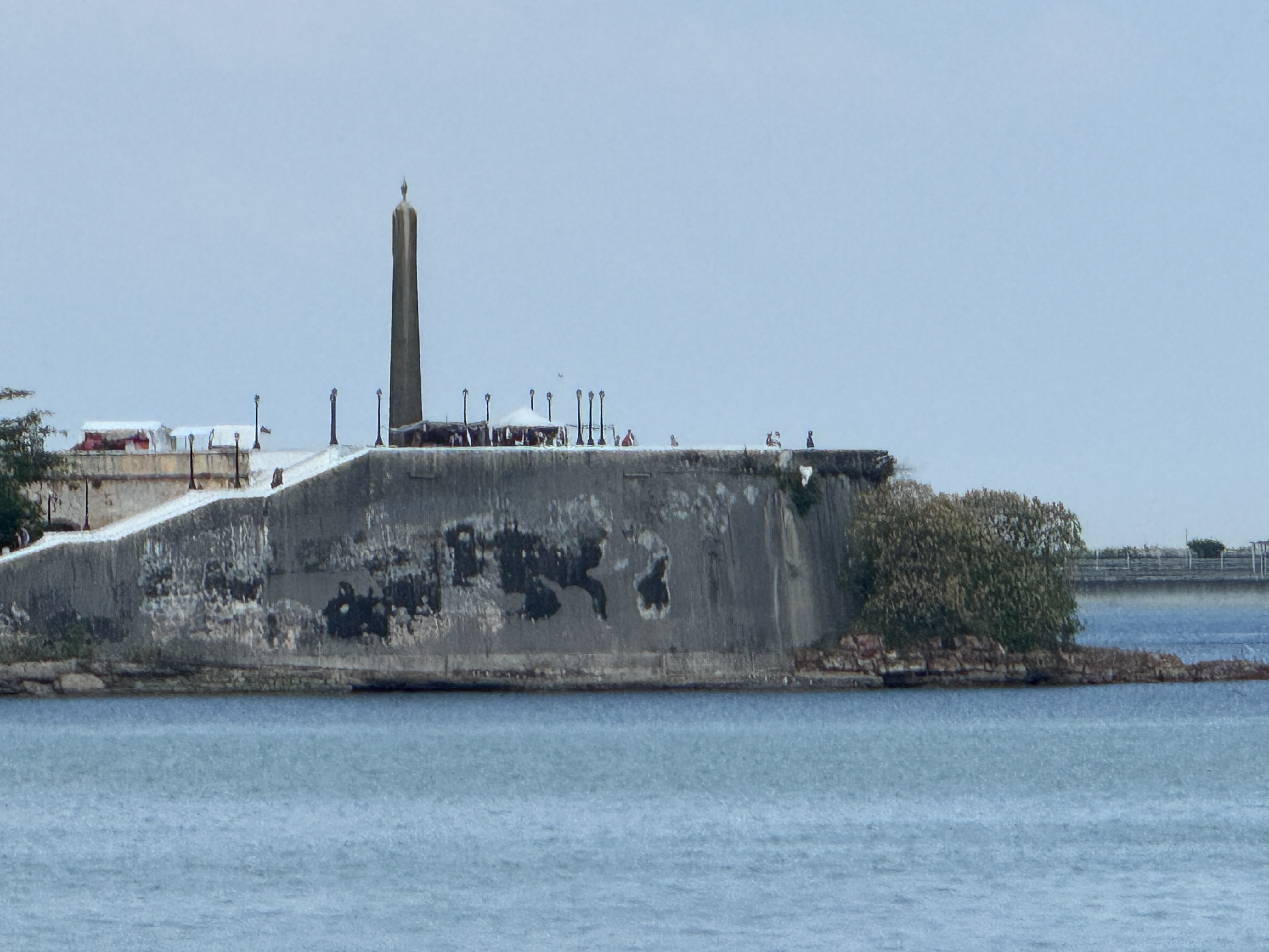 Here, from another spot on the same road and with the tide in, is the city's wall and an obelisk that is part of a monument built about 1920