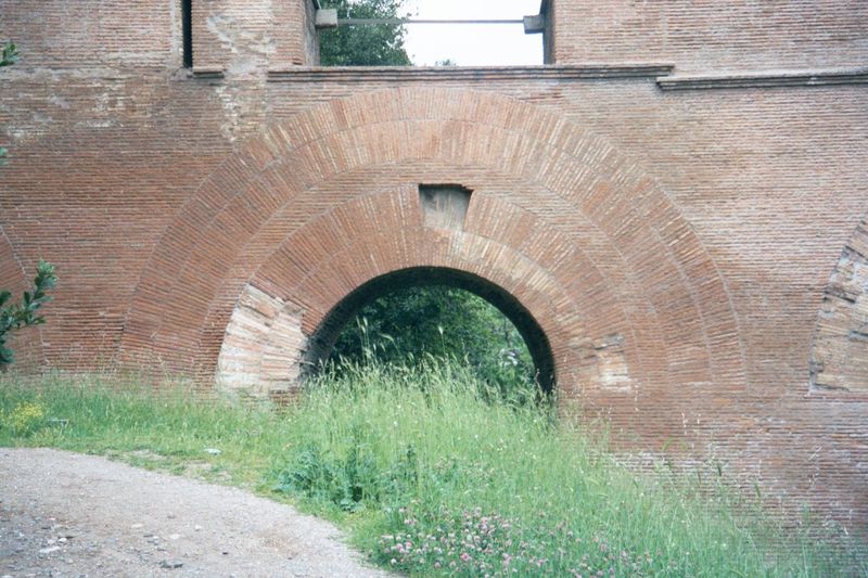 Brickwork where the aqueduct crosses the modern Via di San Gregorio.