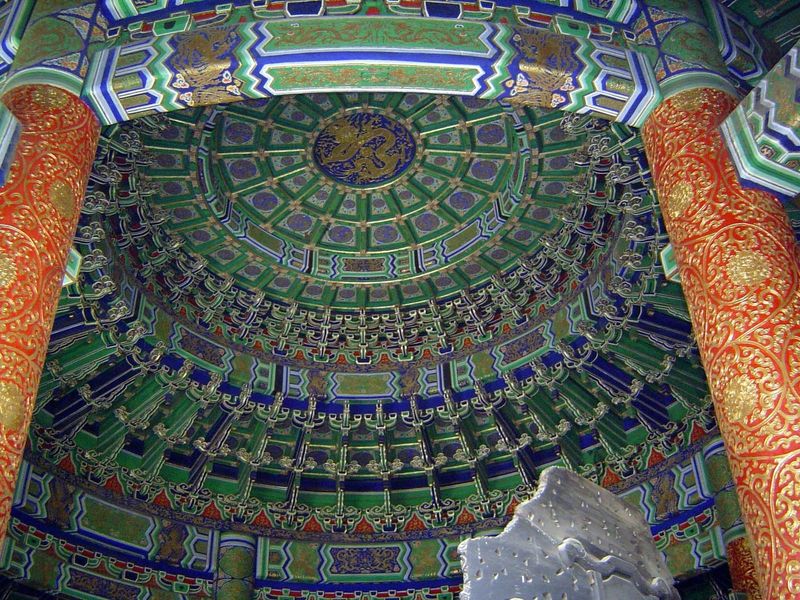 Inside, a bracketed caisson dome with he xi polychrome painting.