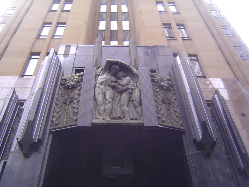 The entrance relief recalls the insurance company and seems appropriate for a company in the business of providing cover.