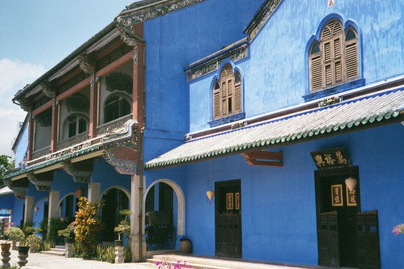 This is the freshly and privately restored Cheong Fatt Tze Mansion, completed in 1904. Cheong Fatt Tze made a fortune in Java in the 1850s, 