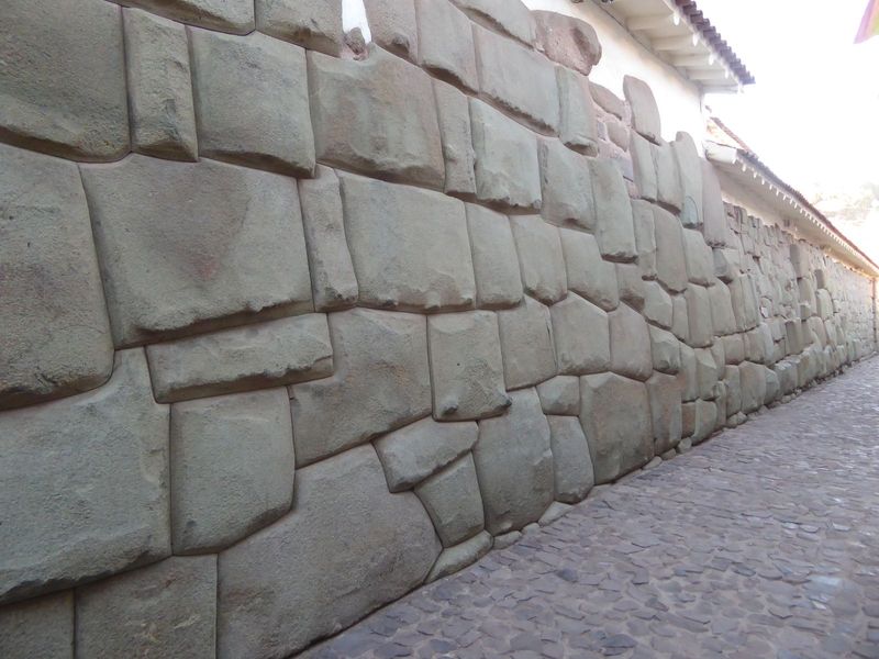 Think the masons couldn't have built a precisely coursed wall?