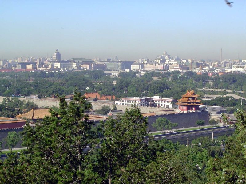 They look over the northwest corner of the Forbidden City and westerly to the New City.

Recommended reading: Wu Liangyong, Rehabilitating t