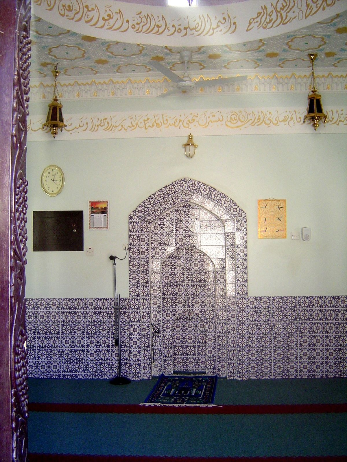 Note the carved door jamb and tile work.