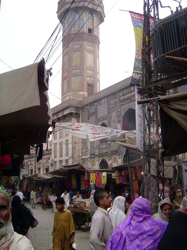 We've come into the Old City at the Delhi Gate and, walking along the busy street, approach this extraordinary minaret. Once, the rent colle