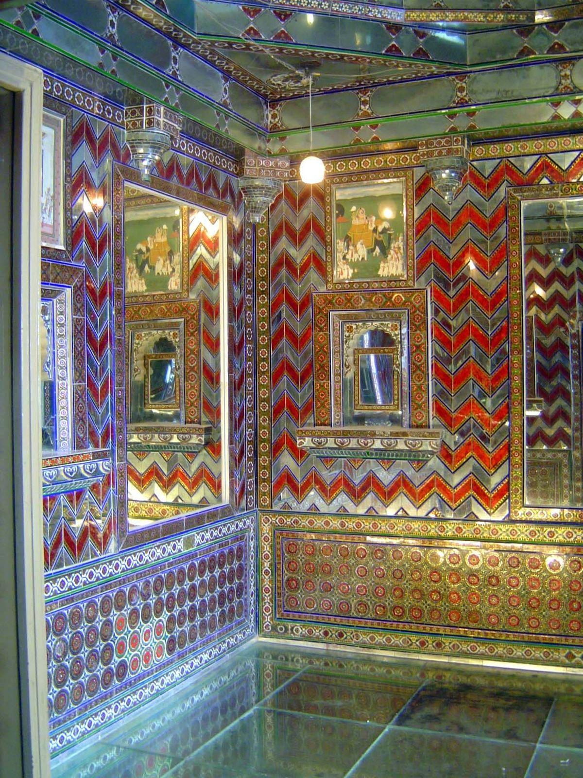 Many of the palace rooms scale not only a rocky ridge but the heights of vulgarity. Case in point: the Dil Kusha Mahal, from the 1620s. The 