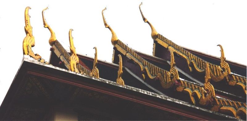 The name wat comes from a Sanskrit word for a "dwelling for pupils; po, from Sanskrit bodhi, enlightenment." The multiple gables indicate hi