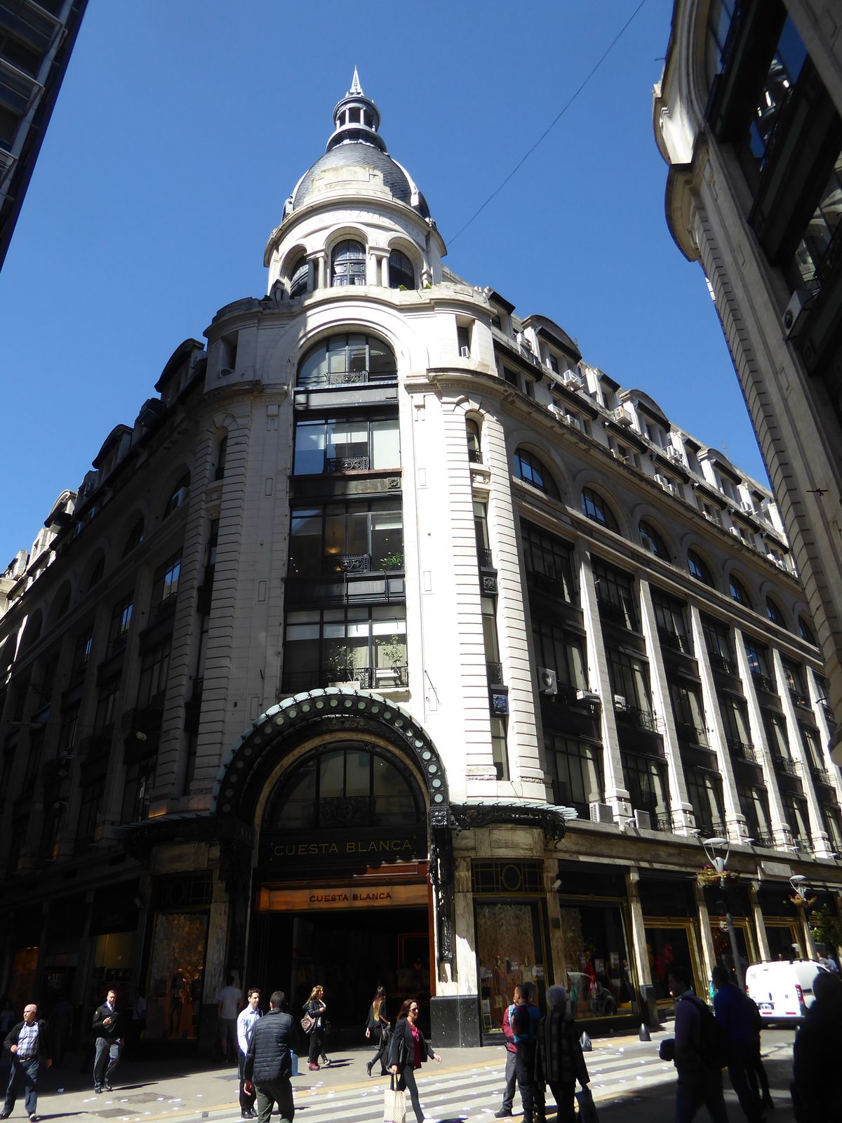 The city has many such ornate, domed corner buildings. This one was built in 1914 for Gath & Chaves, known colloquially as Gatichaves. It wa