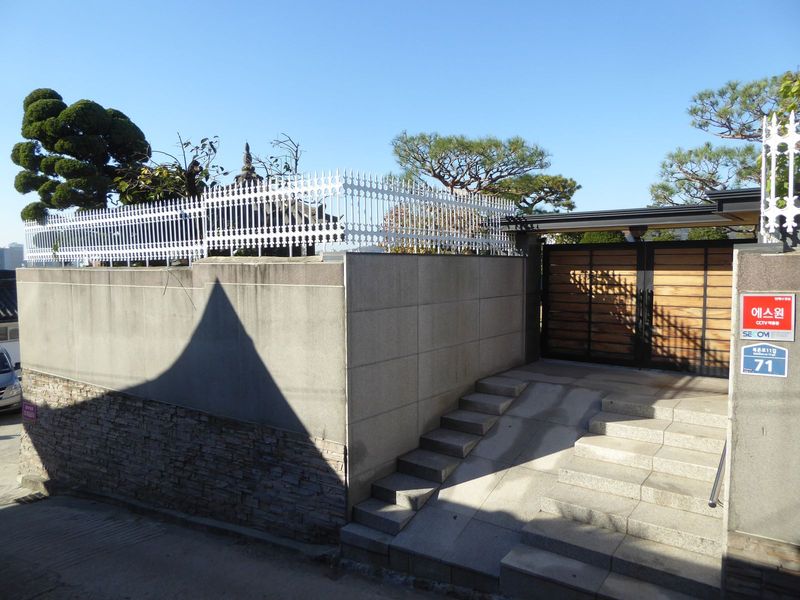 A traditional garden atop a concrete fortress.
